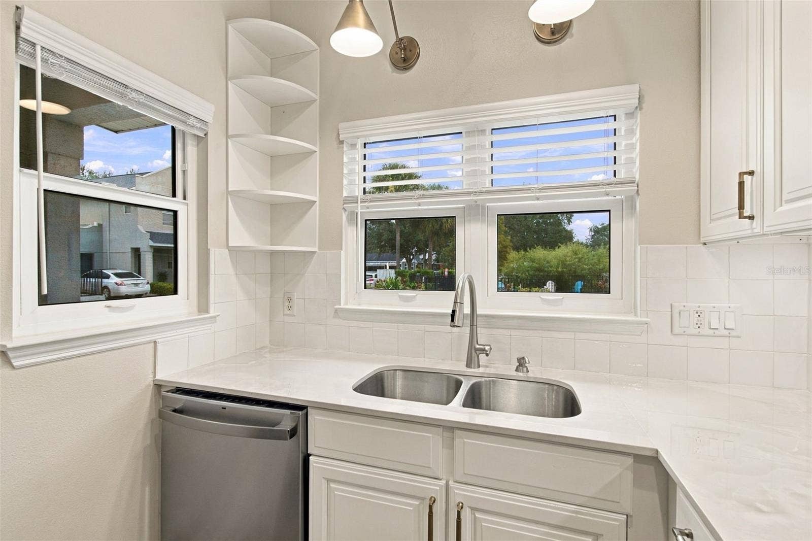 5303 POINT PLEASANT LANE, Tampa, FL 33611 Renovated Kitchen with View to the pool