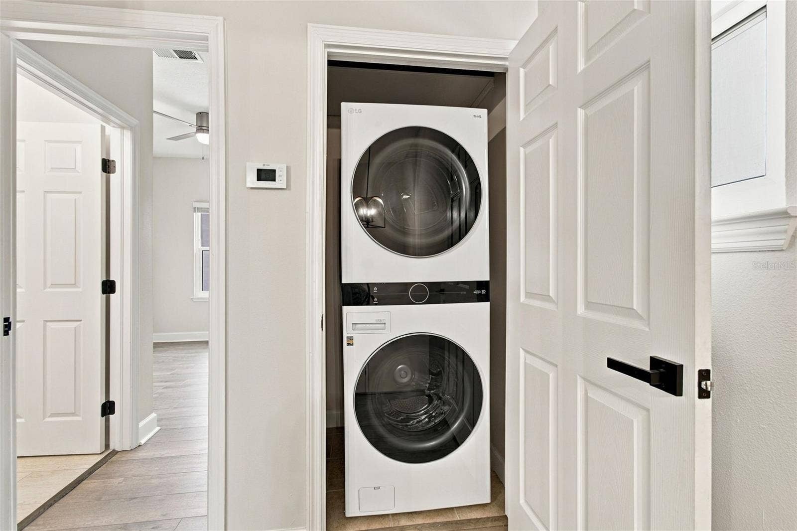 5303 POINT PLEASANT LANE, Tampa, FL 33611 Upstairs Laundry closet