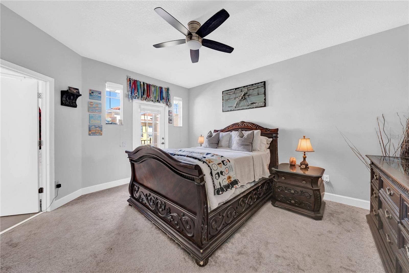 614 105TH LANE N, St Petersburg, FL 33716 Primary Bedroom with Access to Private Balcony