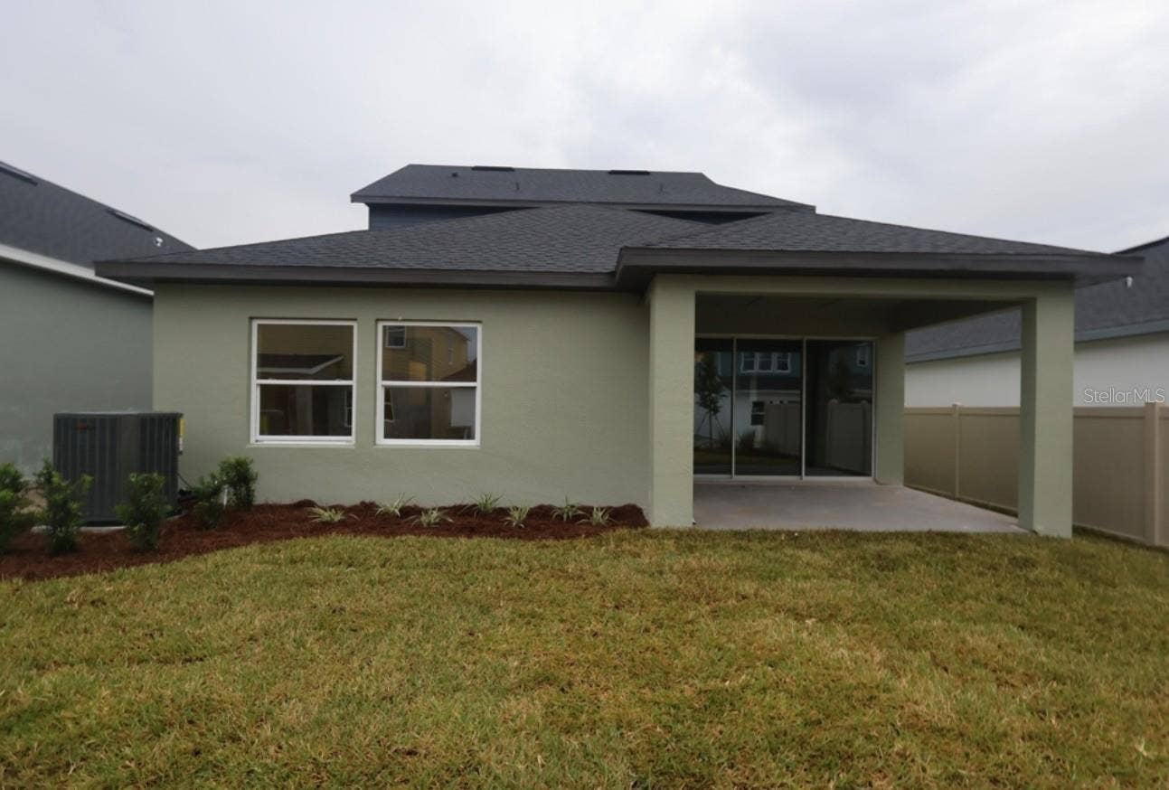 5807 NATIVE OAK STREET, Mount Dora, FL 32757 Rear Exterior **Under Construction