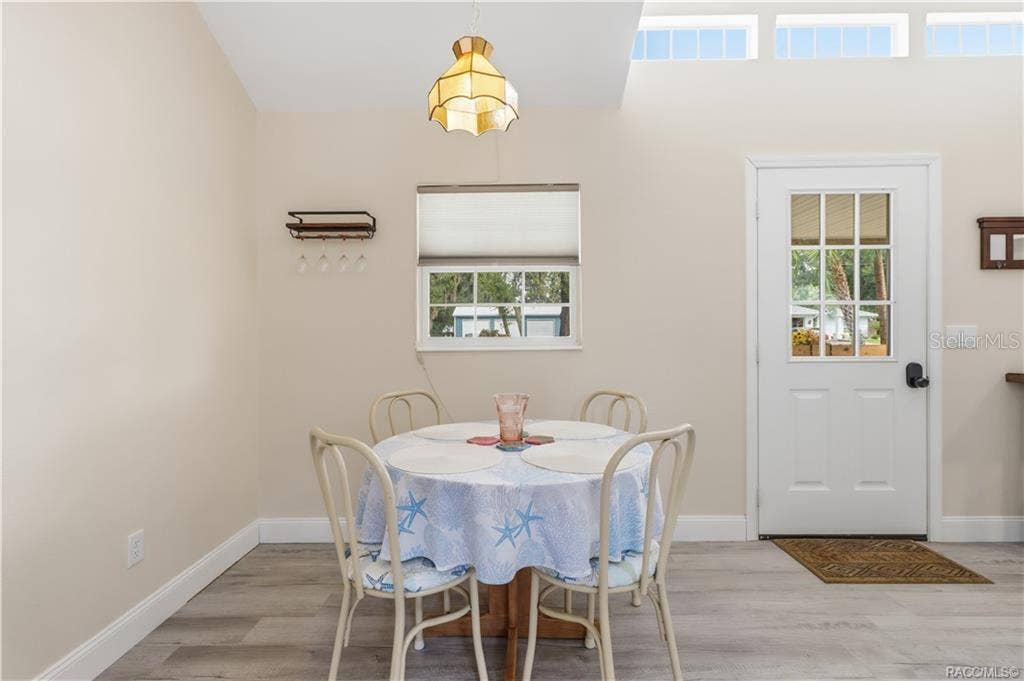 6230 W GLEN ROBBIN COURT, Crystal River, FL 34429 Dining Area Comfortable dining space w/natural light, vaulted ceiling & convenient access to the kitchen & living area.