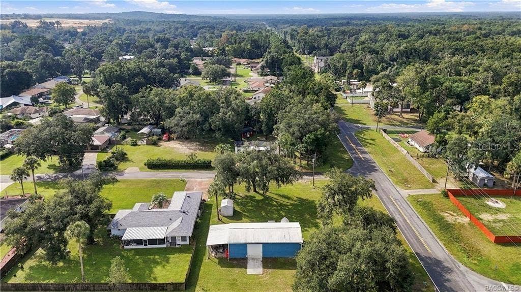 6230 W GLEN ROBBIN COURT, Crystal River, FL 34429 Neighborhood Aerial View Wide aerial perspective capturing the surrounding neighborhood, tree-lined streets & established residential setting.