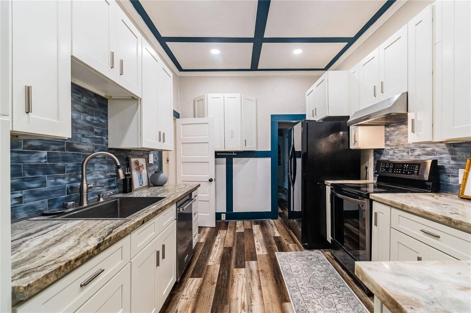 Kitchen with marble counter tops