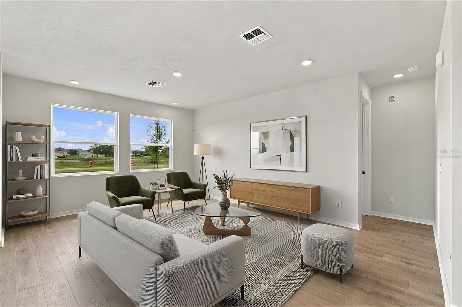 5129 CHATTAHOOCHEE BEND, St Cloud, FL 34771 Family Room **Virtually Staged