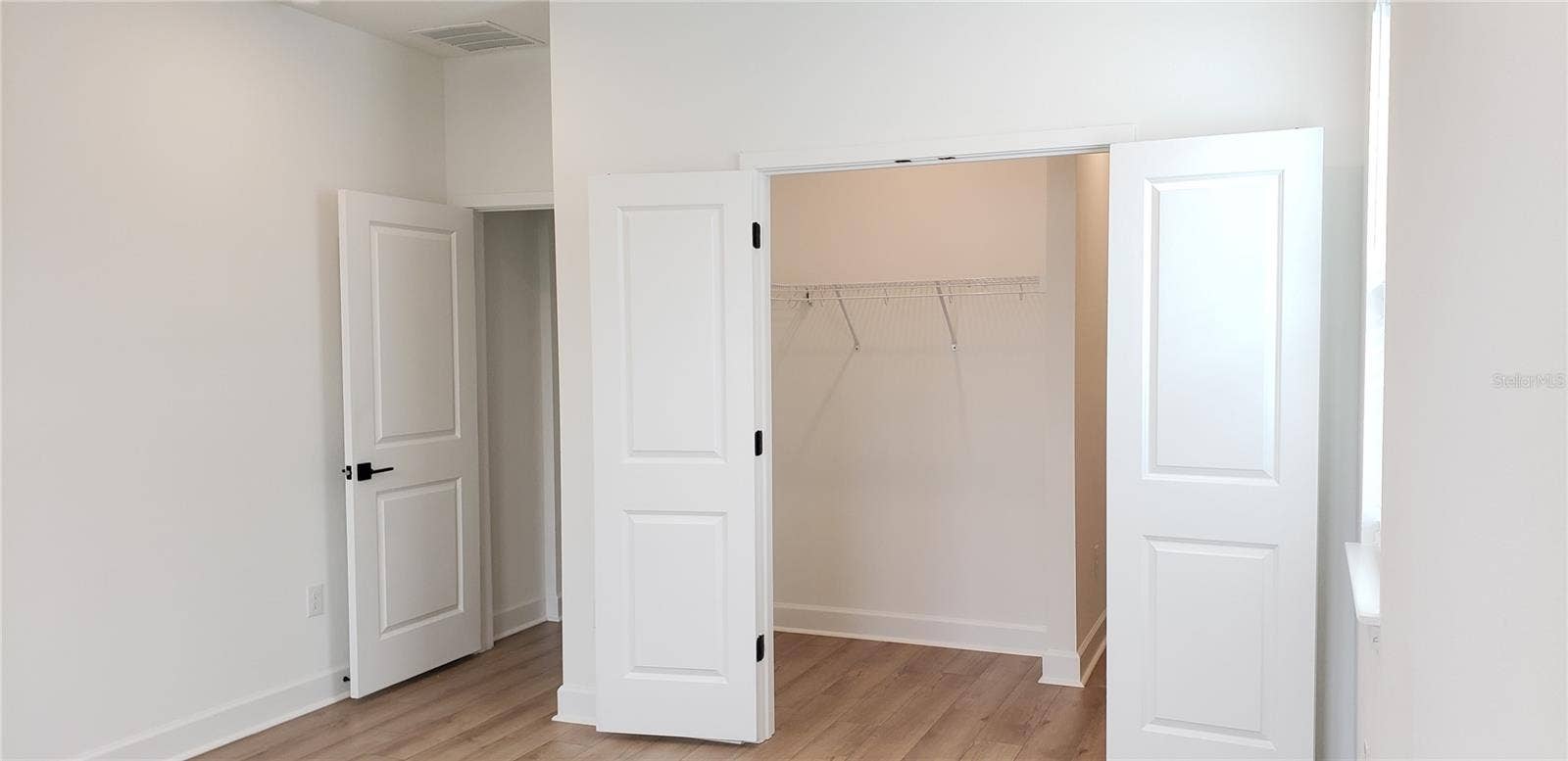 Primary Bedroom & Walk in Closet