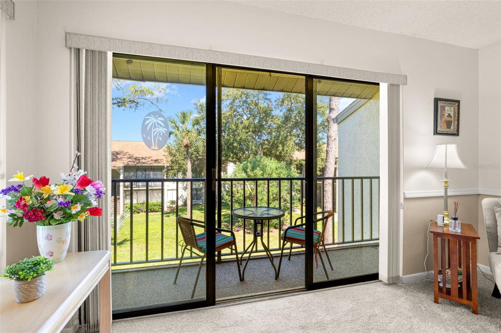 1708 PINE RIDGE WAY E, #B2, Palm Harbor, FL 34684 View of porch from living room