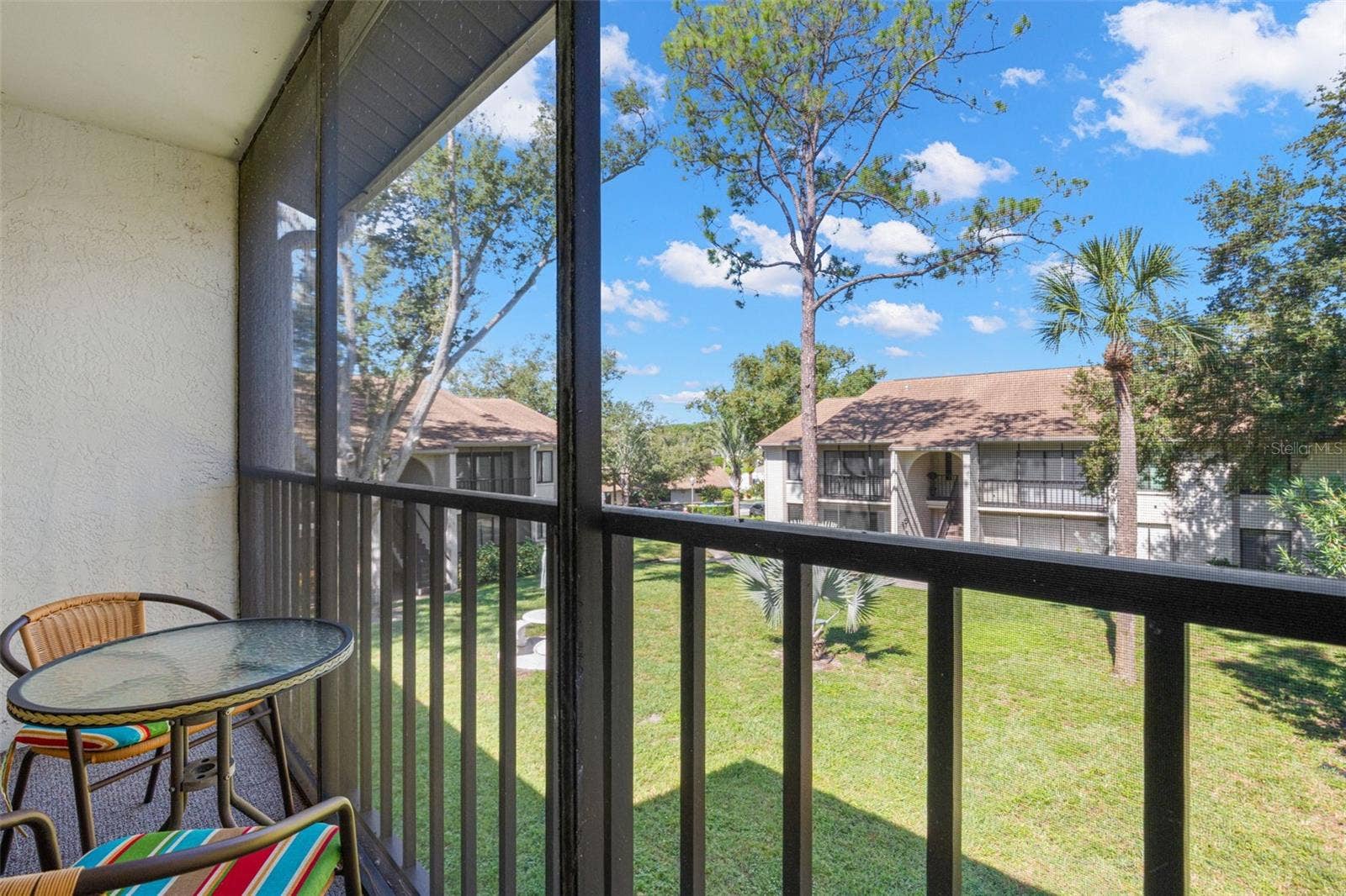 1708 PINE RIDGE WAY E, #B2, Palm Harbor, FL 34684 screened porch