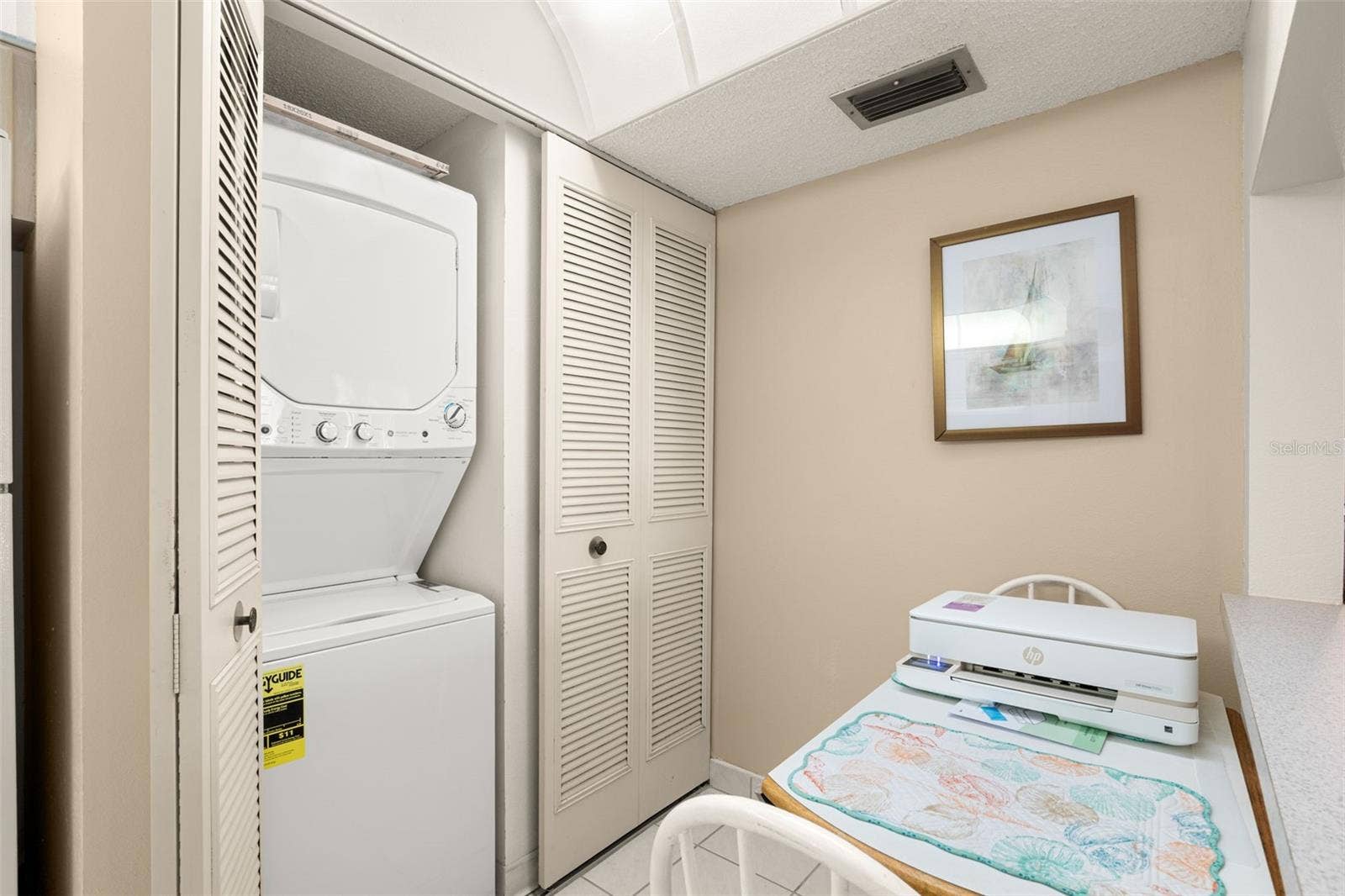 1708 PINE RIDGE WAY E, #B2, Palm Harbor, FL 34684 Washer/dryer in kitchen