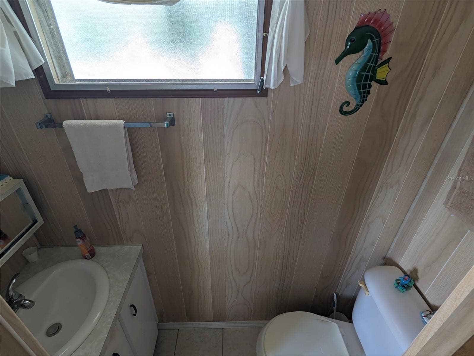 Half bath inside of second bedroom