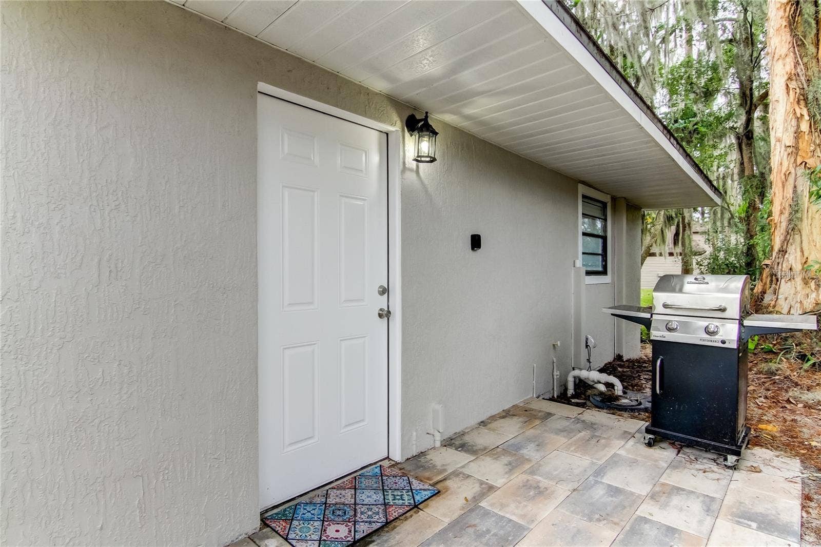 Front Door Covered entry with grill