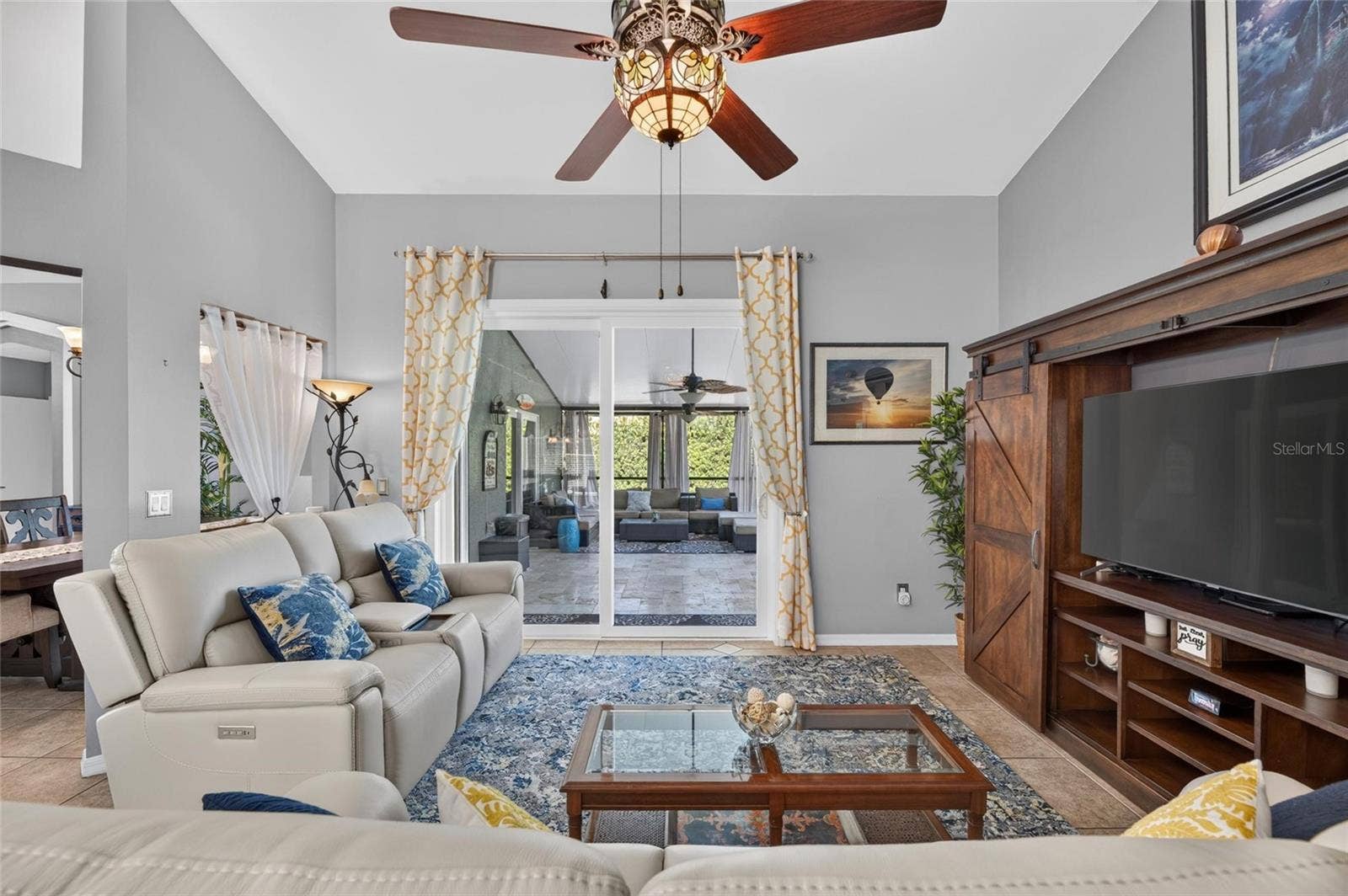 Family room showing sliders out to covered patio