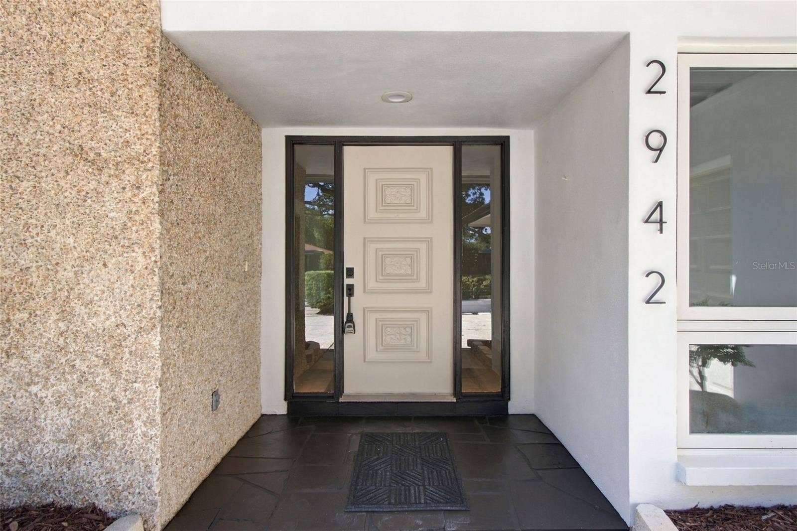 2942 CLUBHOUSE DRIVE W, Clearwater, FL 33761 Front door entrance/ porch