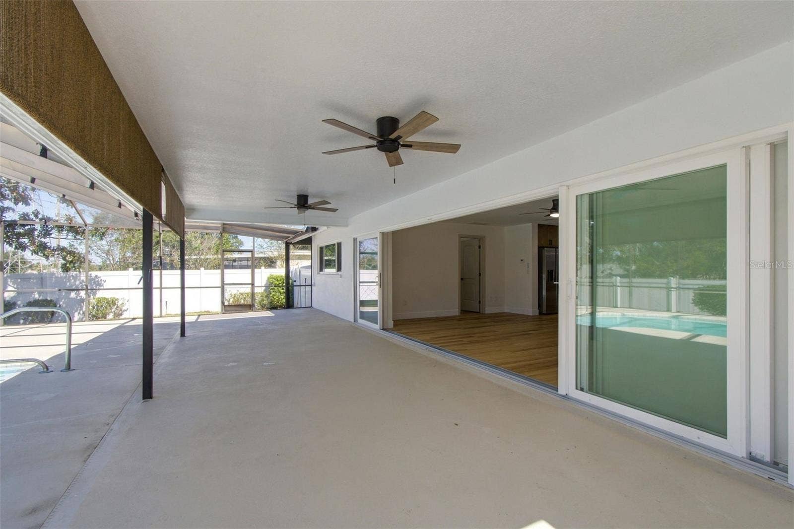 2942 CLUBHOUSE DRIVE W, Clearwater, FL 33761 Pool Patio w/ Sliders open