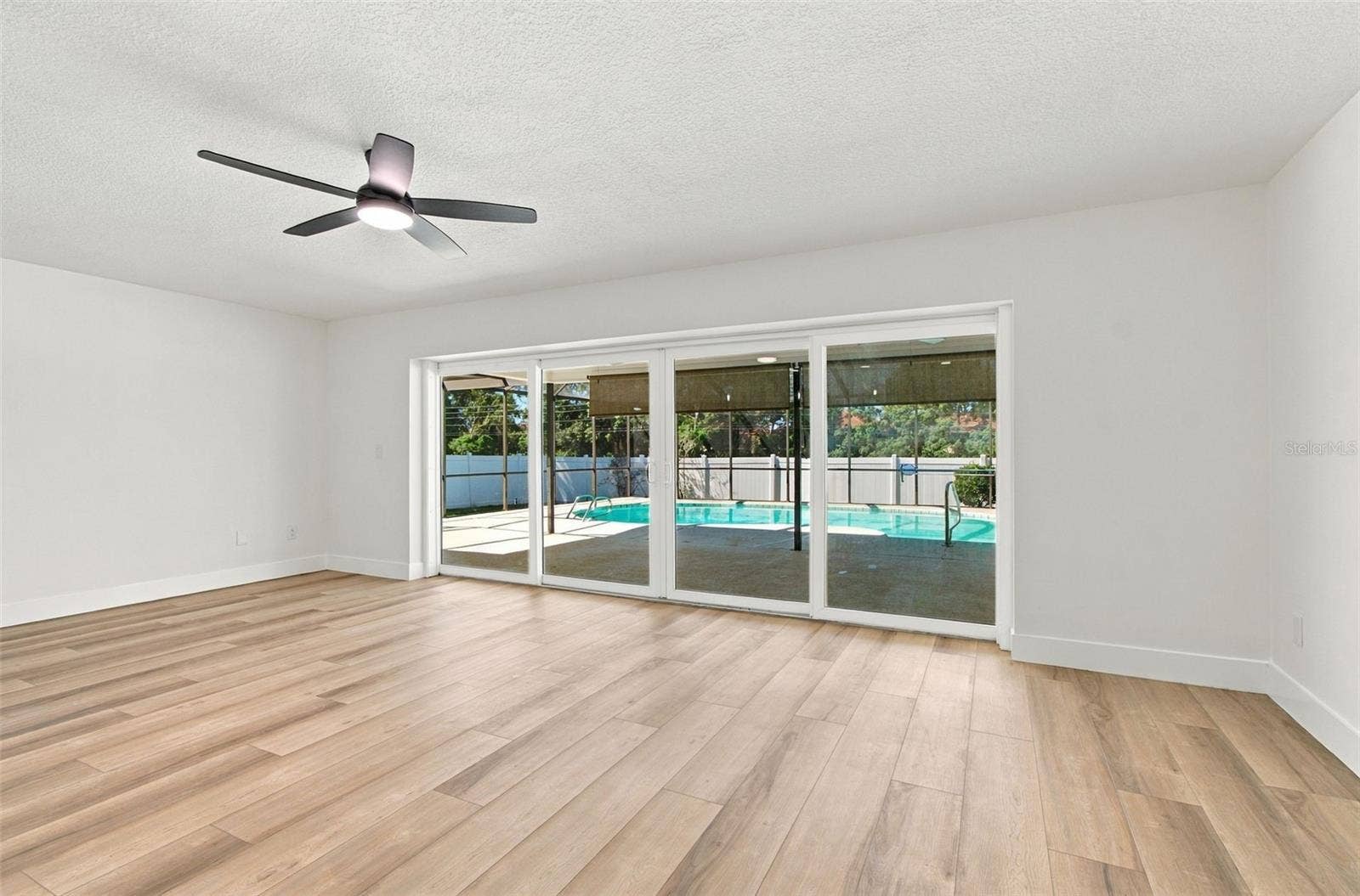 2942 CLUBHOUSE DRIVE W, Clearwater, FL 33761 Kitchen area view of back patio area