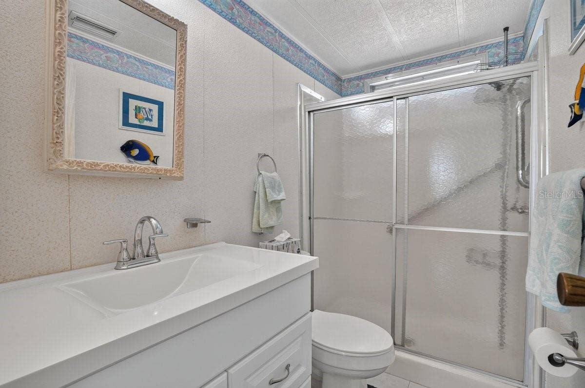 Hall Bath with Newer Cabinet