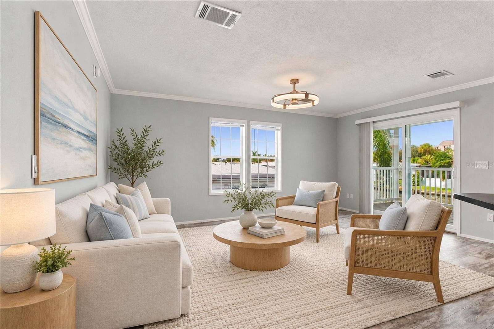 18675 U.S. HIGHWAY 19 N., #349, Clearwater, FL 33764 Open Living Room wth Sliders to back patio and water access