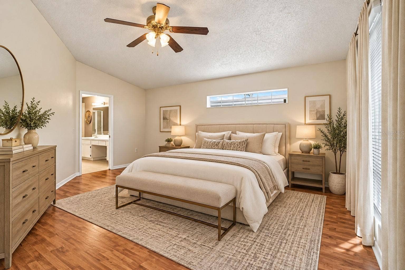 610 LAKEMONT DRIVE, Brandon, FL 33510 Virtually staged Primary bedroom laminate flooring