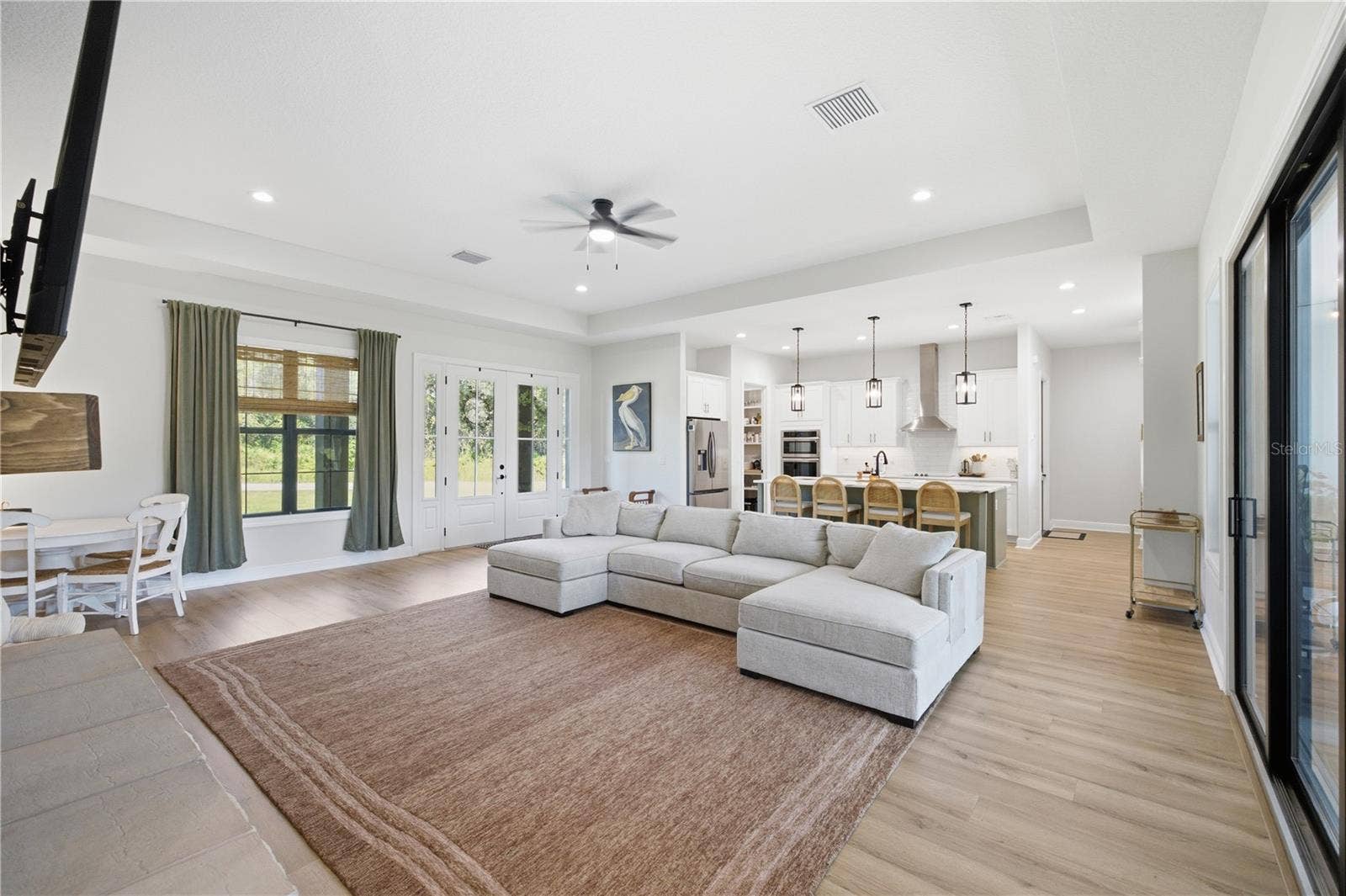 2664 WILSKY ROAD, Land O Lakes, FL 34639 12 FT Tray Ceiling in the Great Room and Black Framed interior and exterior double pane windows.