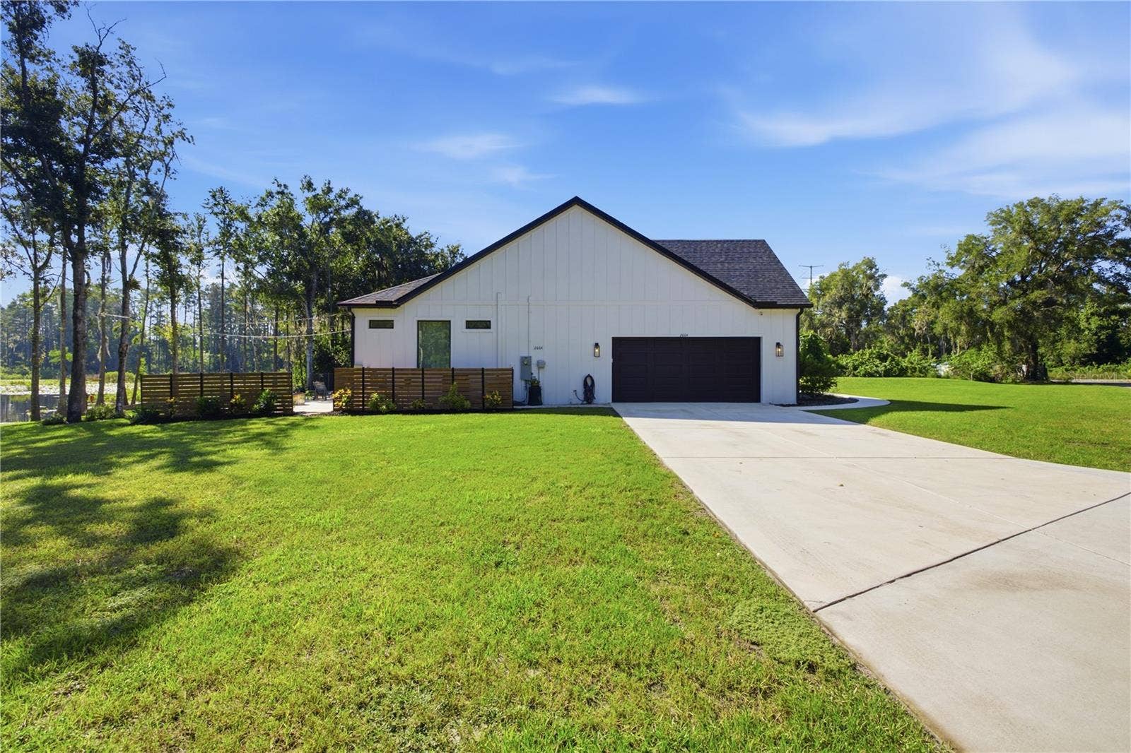 2664 WILSKY ROAD, Land O Lakes, FL 34639 side load garage.