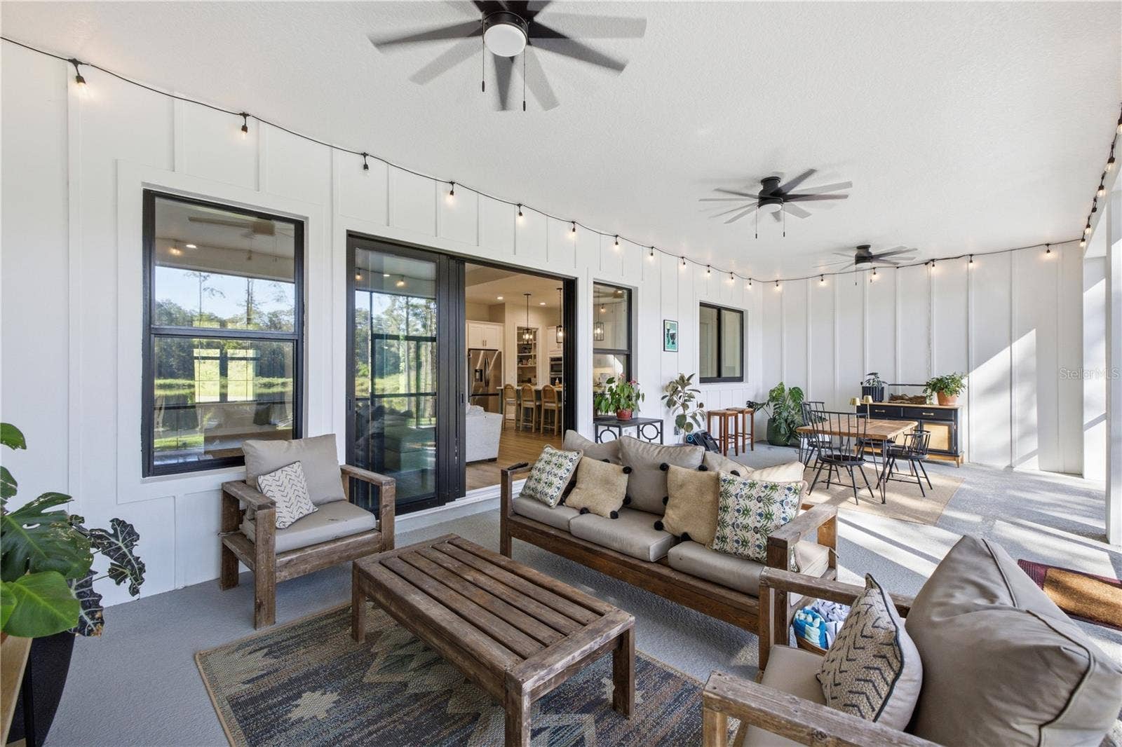 2664 WILSKY ROAD, Land O Lakes, FL 34639 Other side of HUGE rear porch.