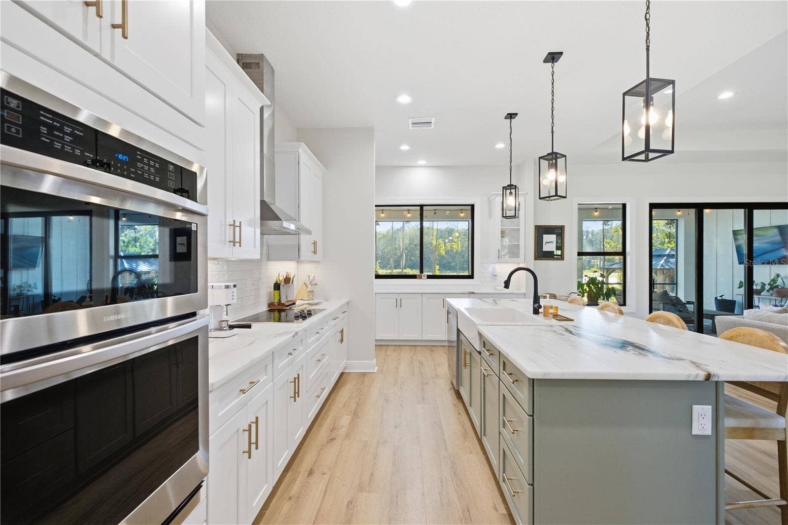2664 WILSKY ROAD, Land O Lakes, FL 34639 Wall mounted Samsung convection oven/microwave and oven.