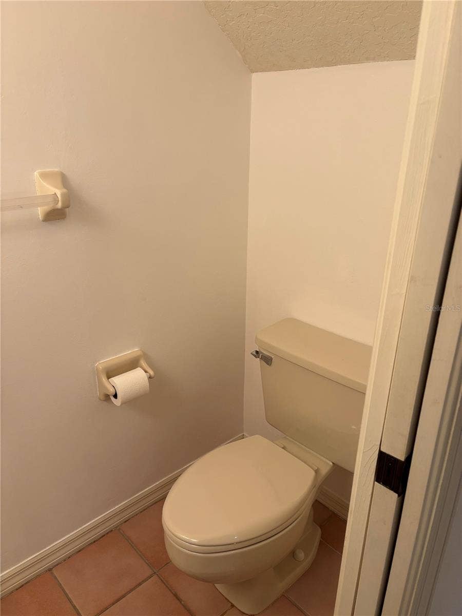 402 DATE PALM COURT NE, St Petersburg, FL 33703 Half Bath downstairs