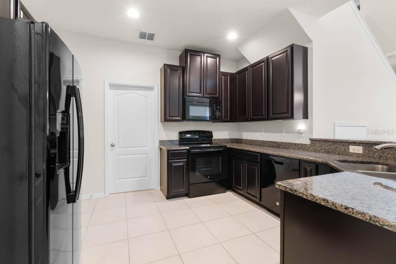Kitchen with Granite Counter tops