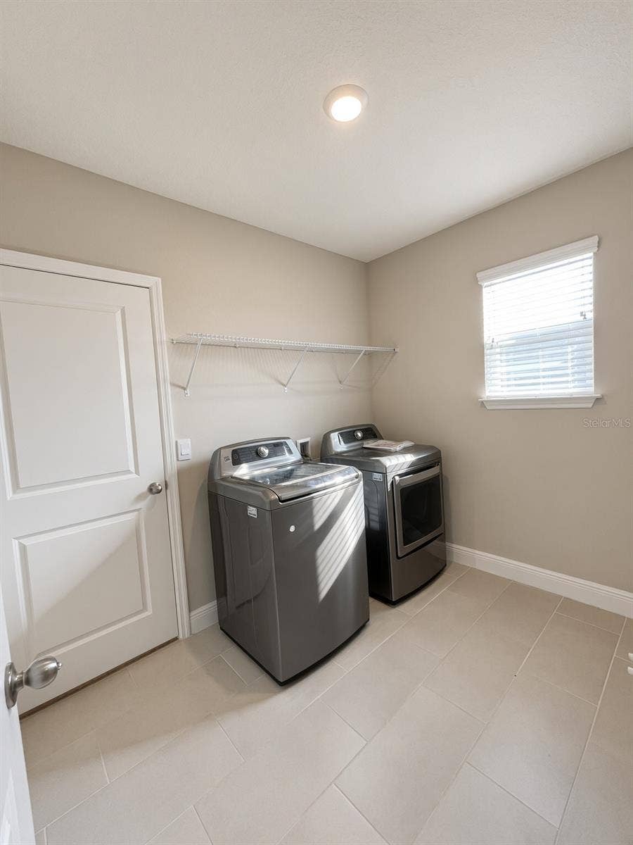 140 BRIGHT IBIS AVENUE, Apollo Beach, FL 33572 Laundry Room Upstairs