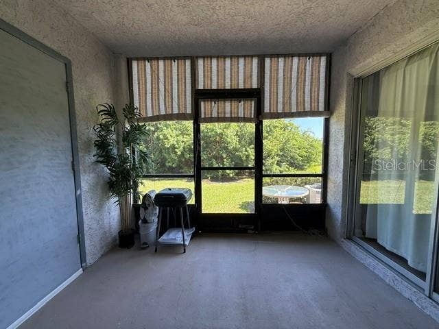 11201 122ND AVENUE, #209, Largo, FL 33778 screened patio with canvas window covers. access from primary bedroom too