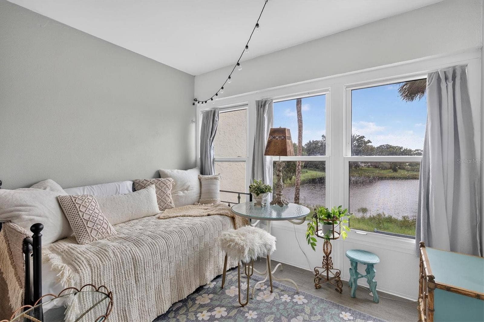 Florida room overlooks gorgeous pond with abundant wildlife.