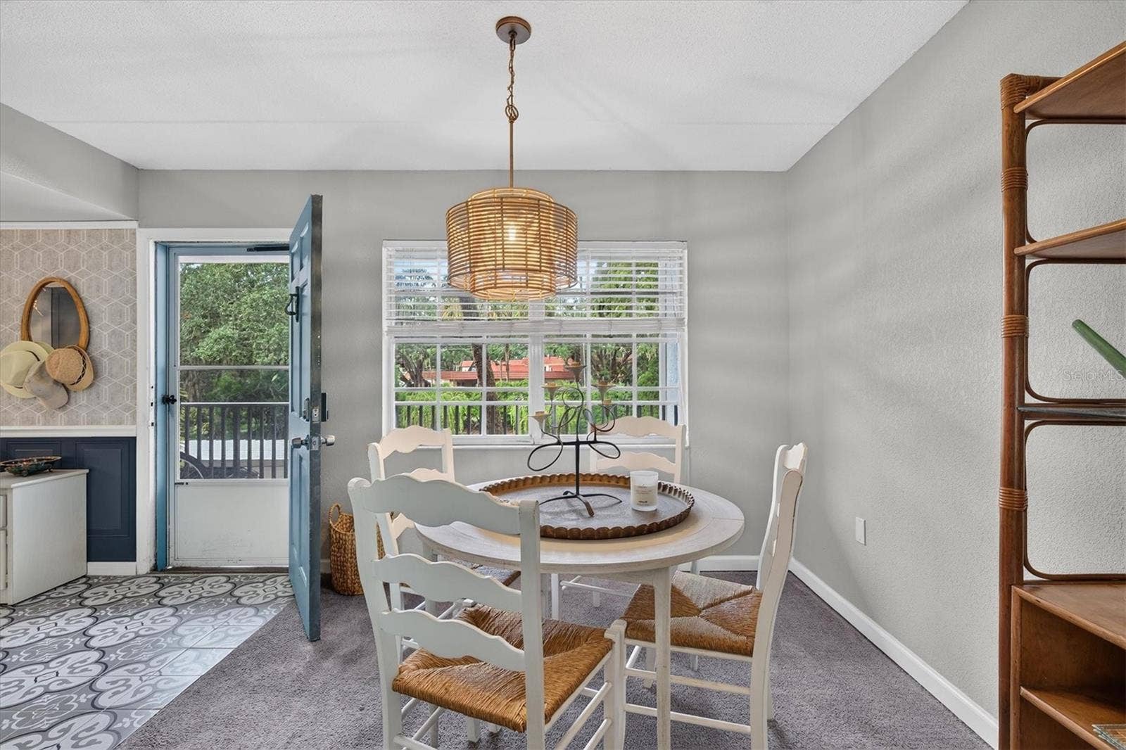 Dining room with coastal chandelier.