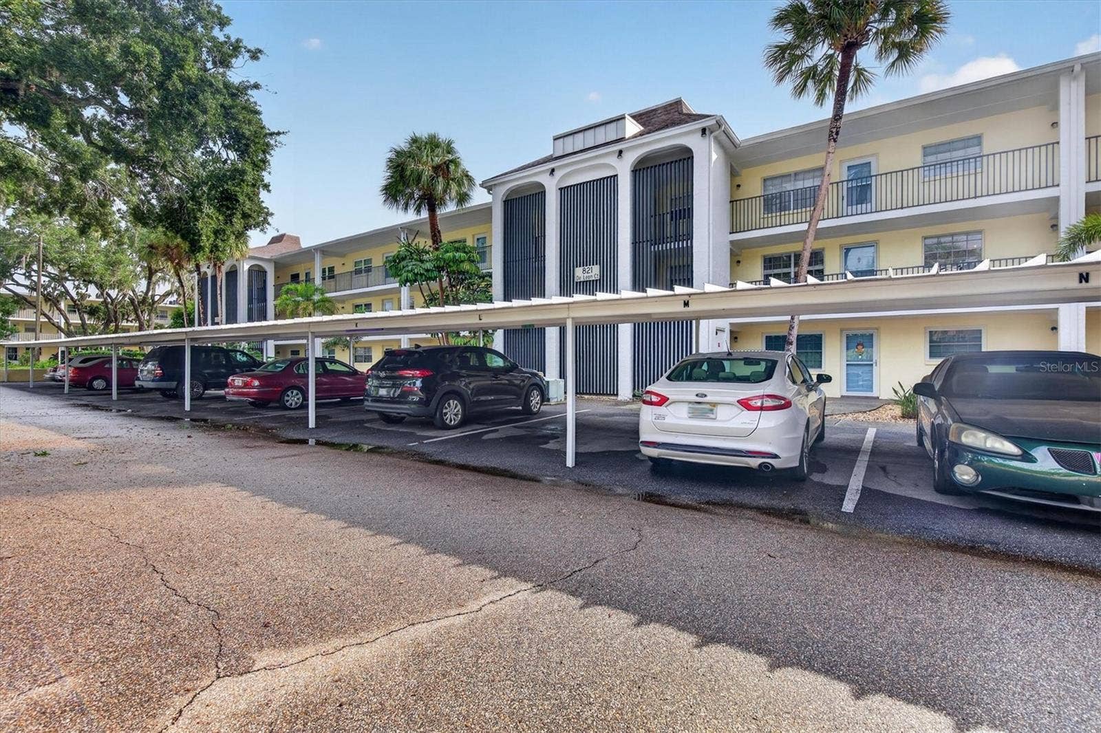 Reserved carport right next to the elevator.