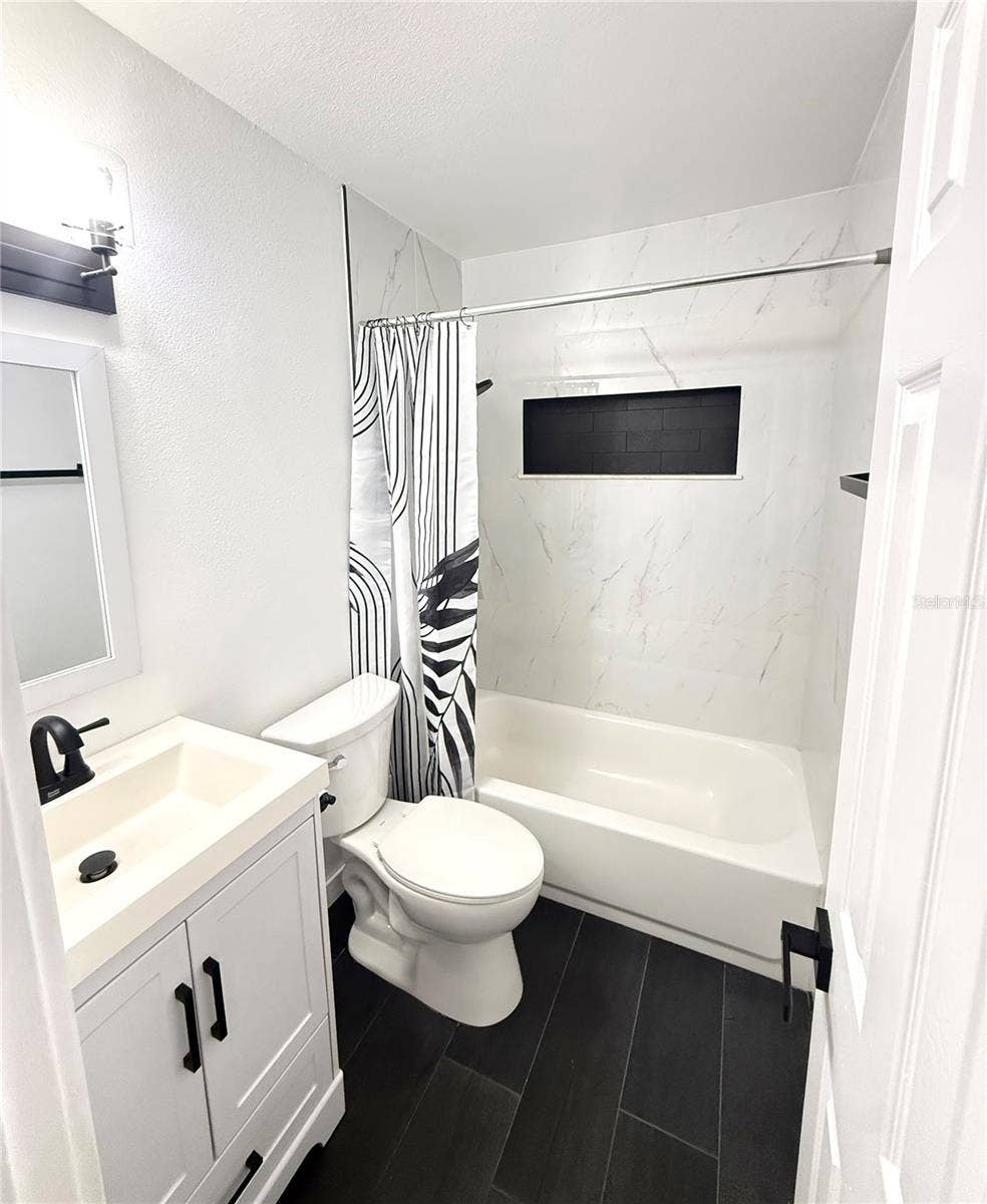 6570 67TH AVENUE N, Pinellas Park, FL 33781 Hallway Bathroom