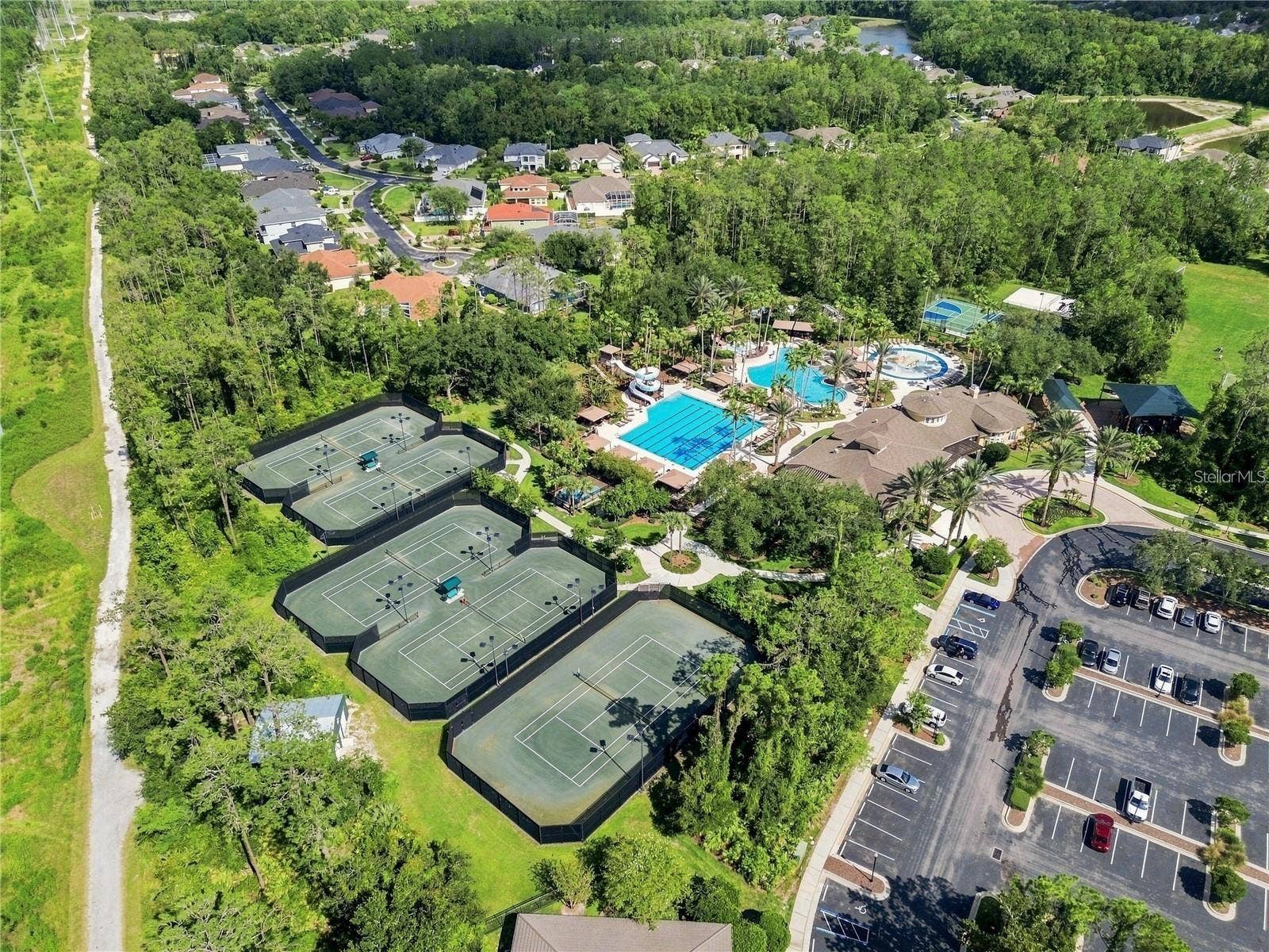Seven Oaks is a premier master-planned community comprising nearly 30 pocket neighborhoods of single-family homes and townhomes, anchored by the signature 17-acre Sports Club with resort-class amenities. The CDD was established in January 2001, and homes were built from 2002 through 2018 by multiple national builders. With approximately 4,200 residents, it is one of Wesley Chapel's largest and most established communities.