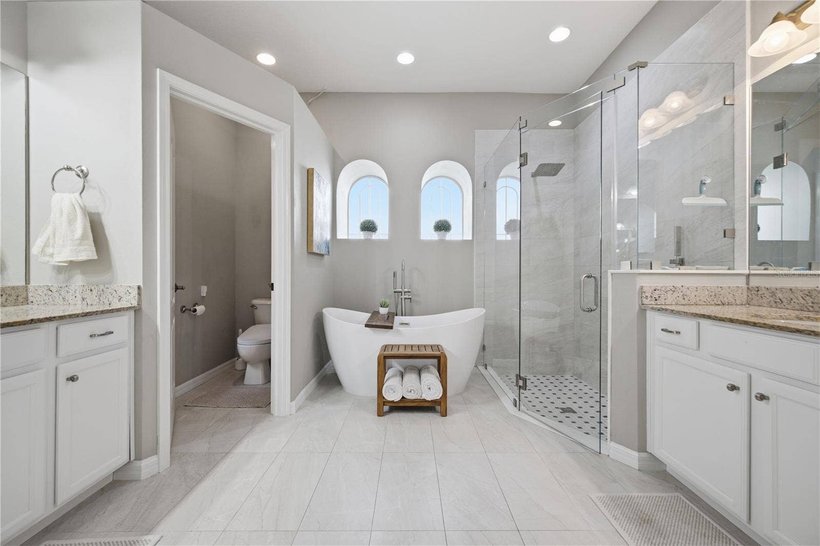 Updated Primary Bathroom, with double vanities.