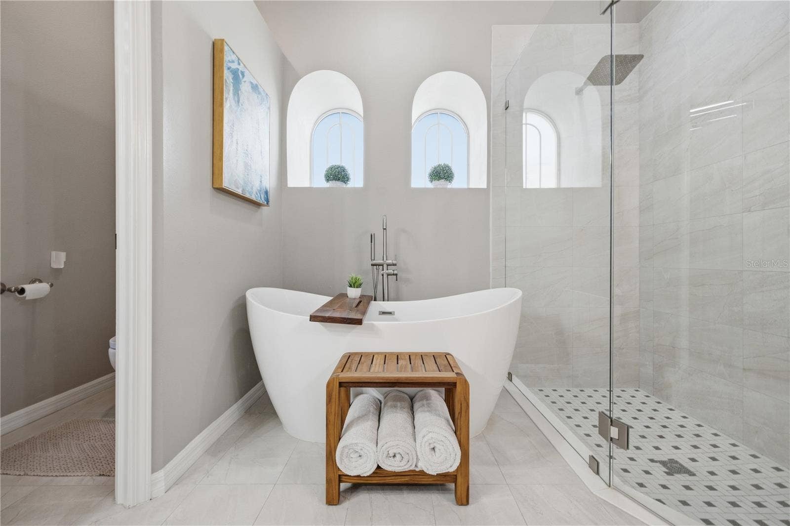 Freestanding Soaking Tub in updated master bath.