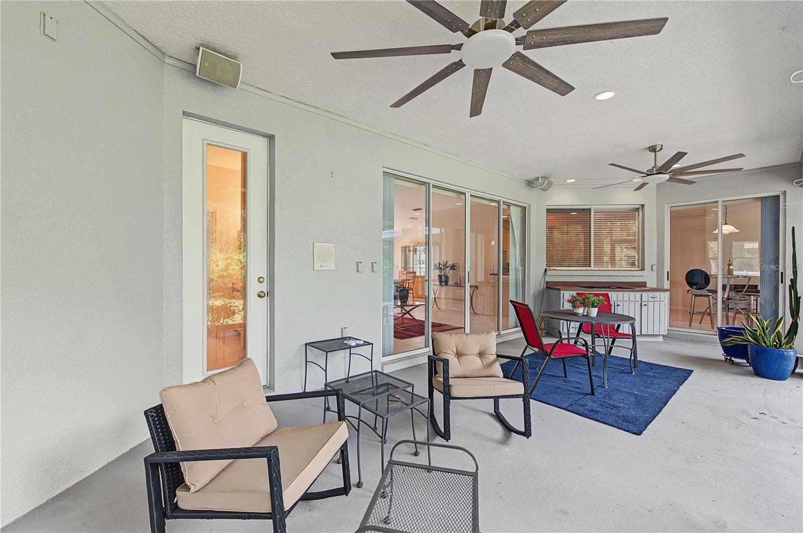 Back Porch with new ceiling fans - French doors off of the master Bedroom