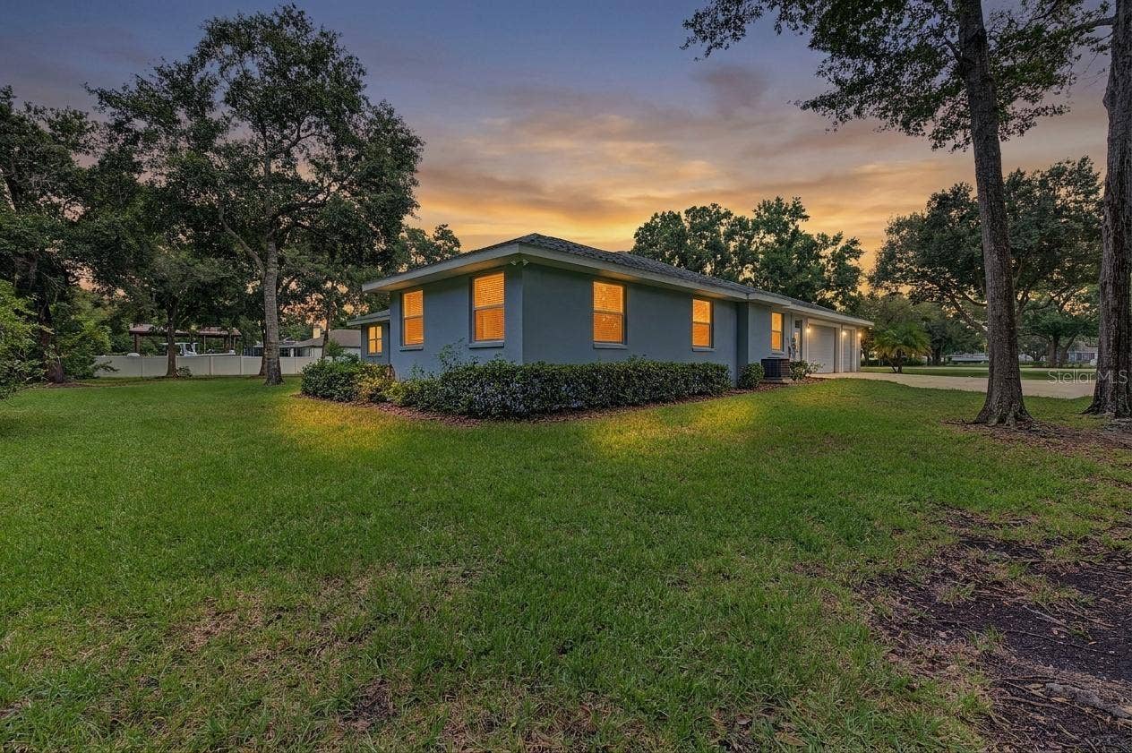 Rear and Side exterior - huge front and back yard