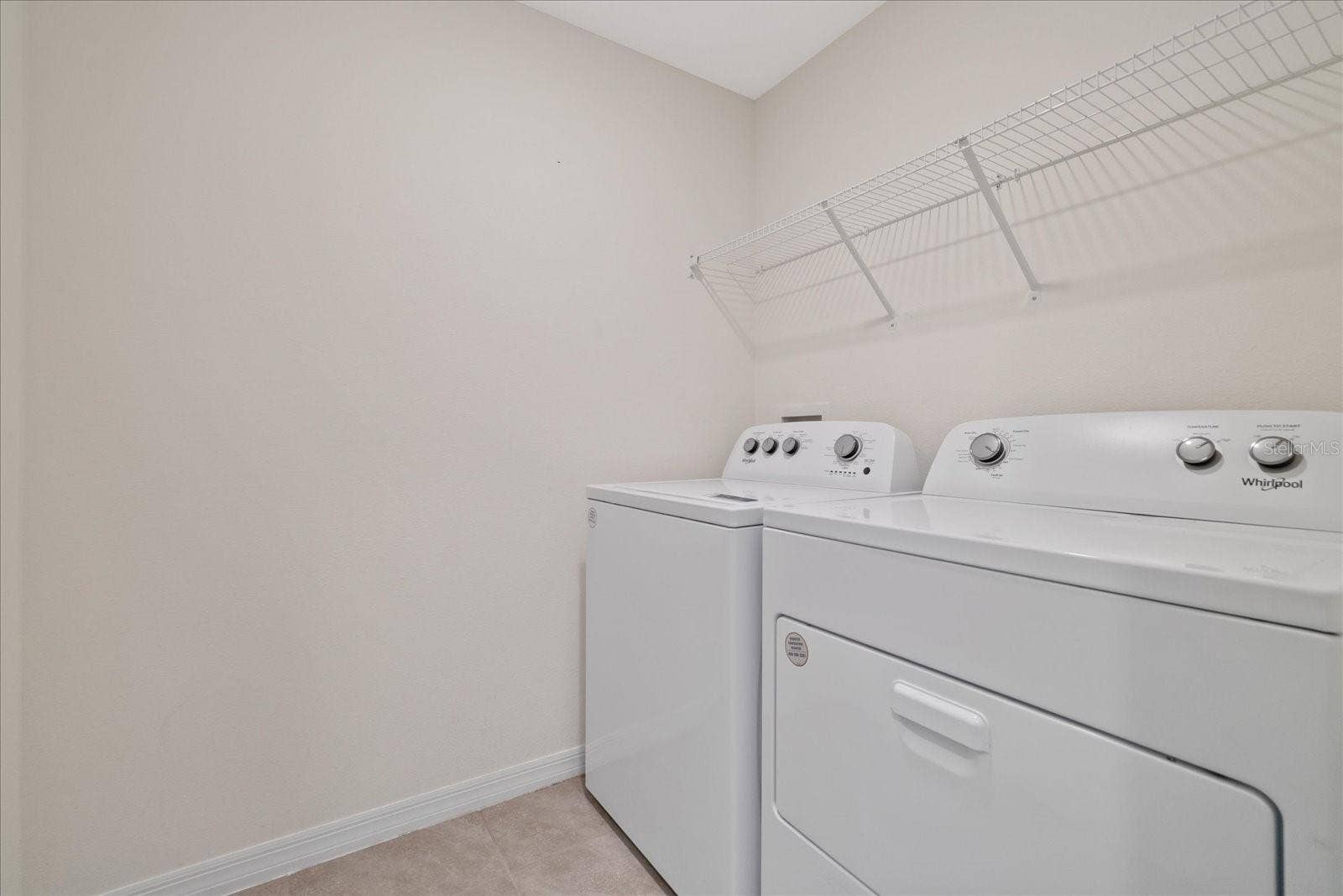 4568 SAND DOLLAR WAY, Zephyrhills, FL 33541 Laundry room