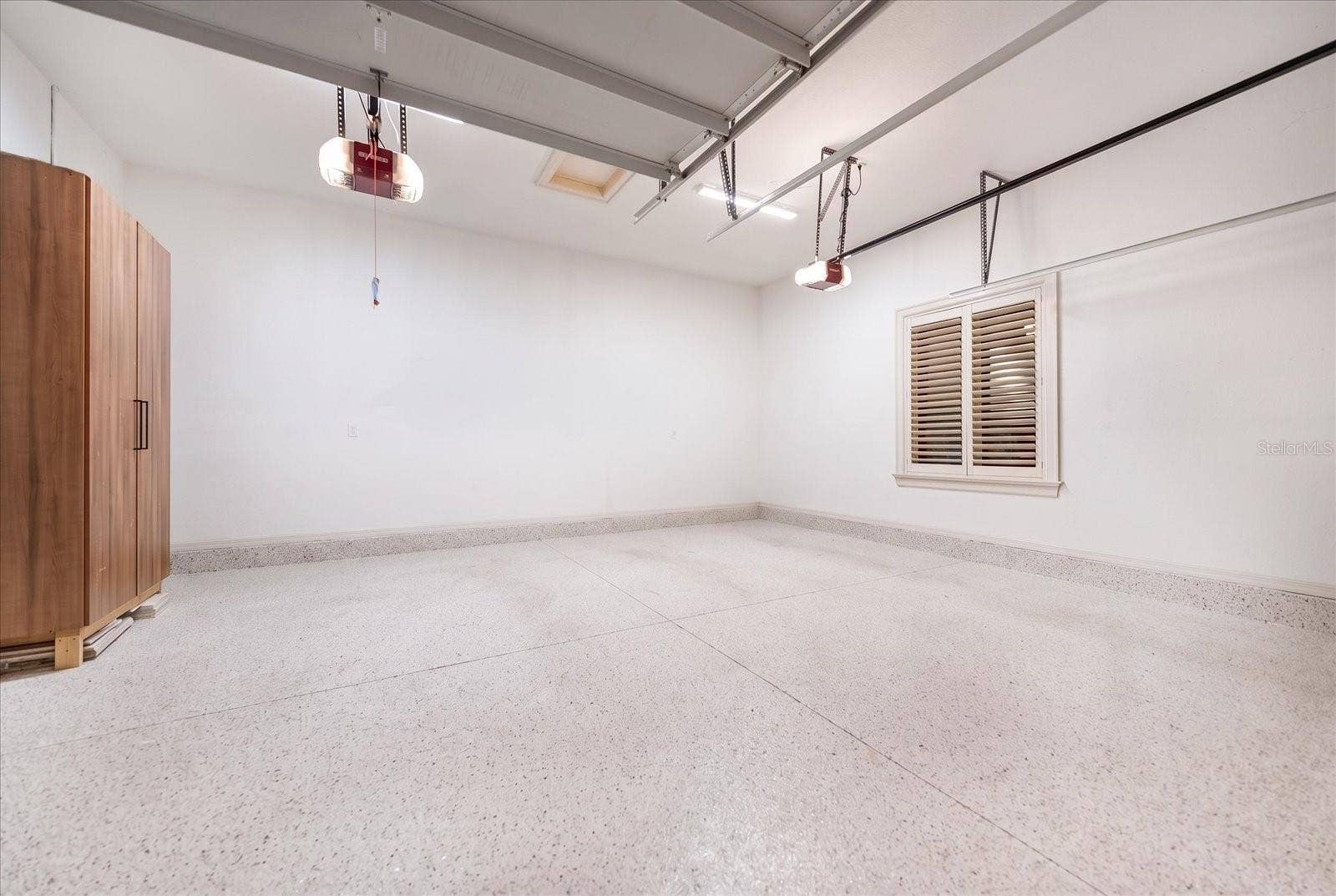 2056 COVE TRACE, Palm Harbor, FL 34685 2 x 2 Car Garages! Both are side entry garages adding to the Luxurious Elevation Setting