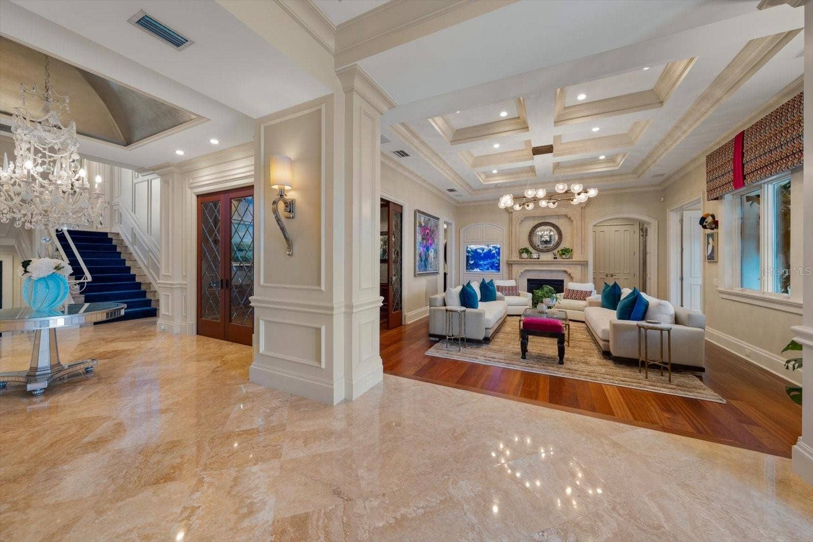 2056 COVE TRACE, Palm Harbor, FL 34685 Statement chandeliers and a Built-in Saltwater Aquarium with live coral adds distinctive character!