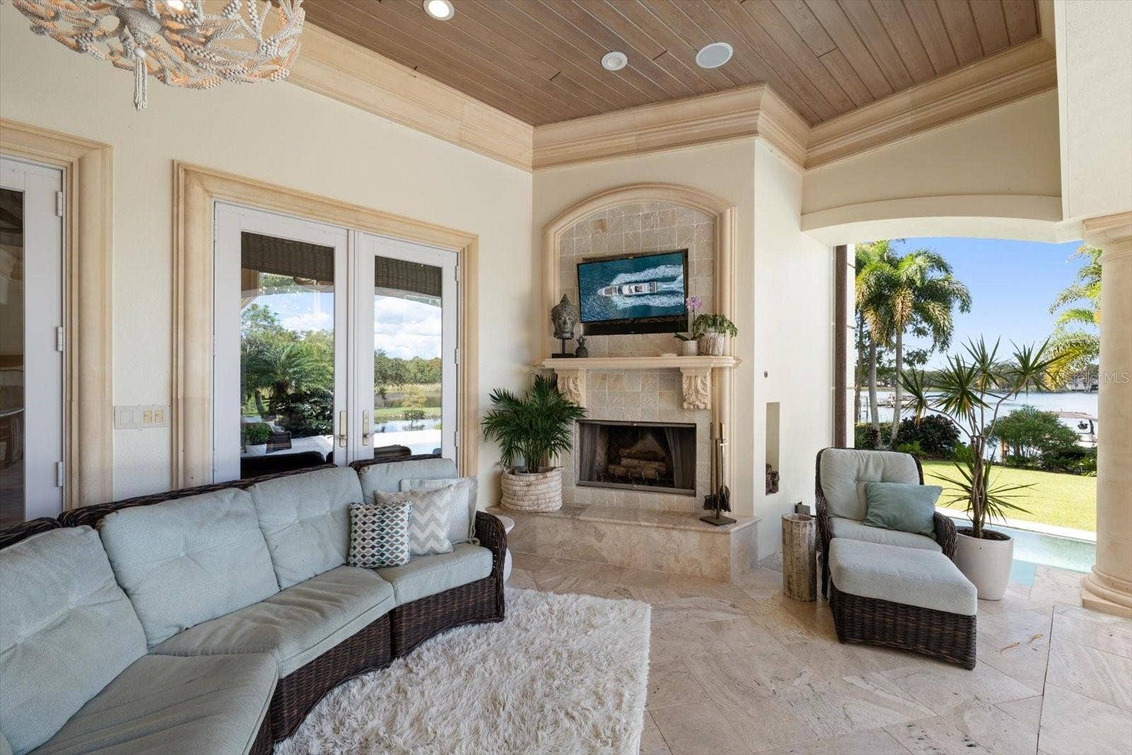 2056 COVE TRACE, Palm Harbor, FL 34685 Wood clad ceiling with precast stone crown molding