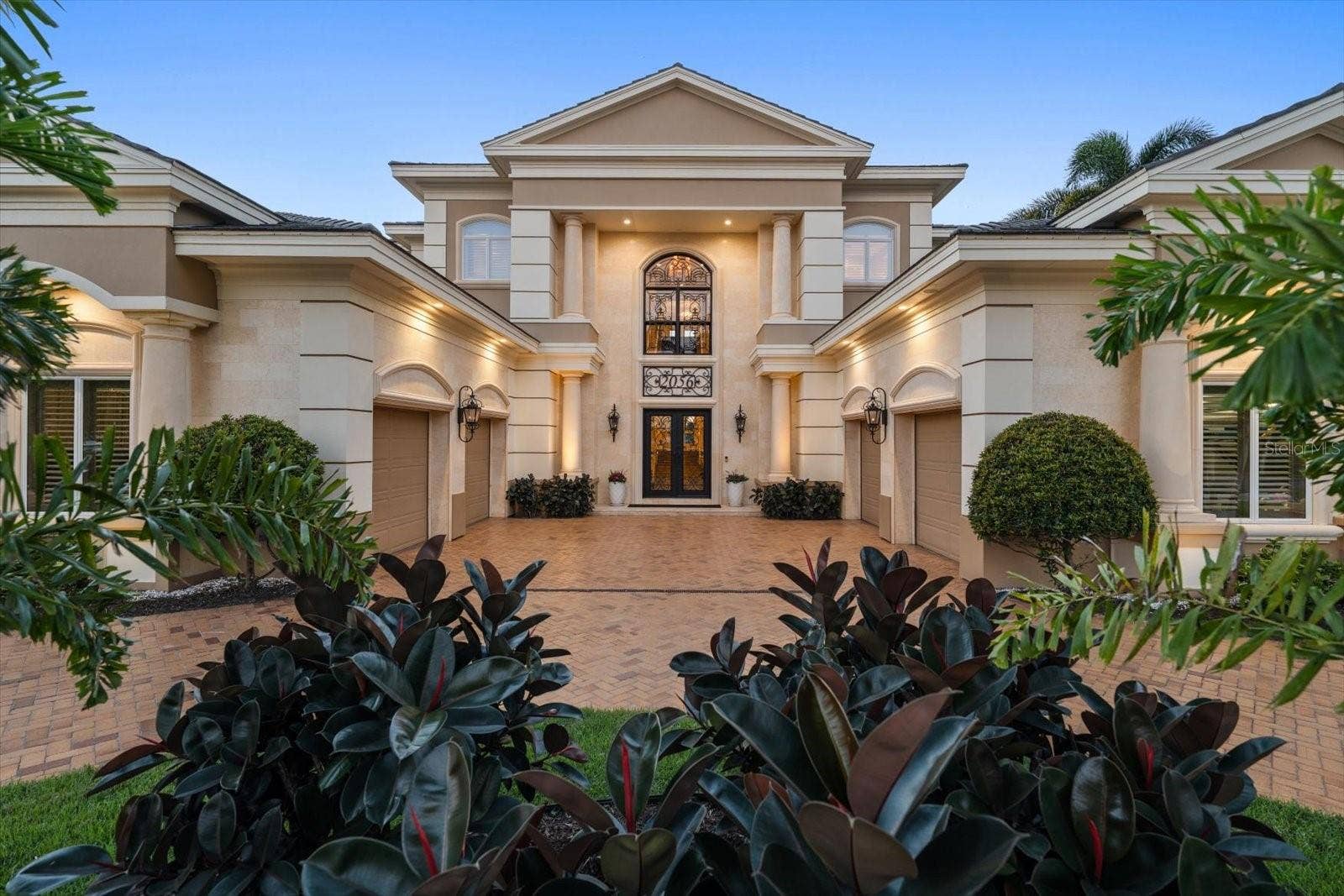 2056 COVE TRACE, Palm Harbor, FL 34685 The Architectural Columns and Natural Gas Lanterns create a Memorable First Impression!