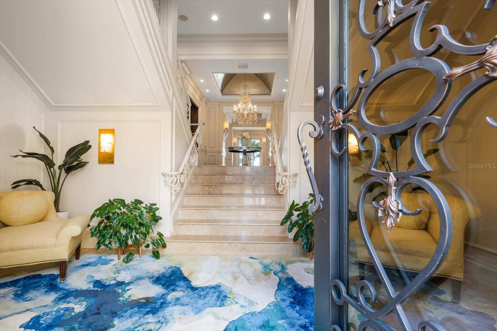 2056 COVE TRACE, Palm Harbor, FL 34685 Limestone Tiled Entry and Custom Double Iron Front Doors