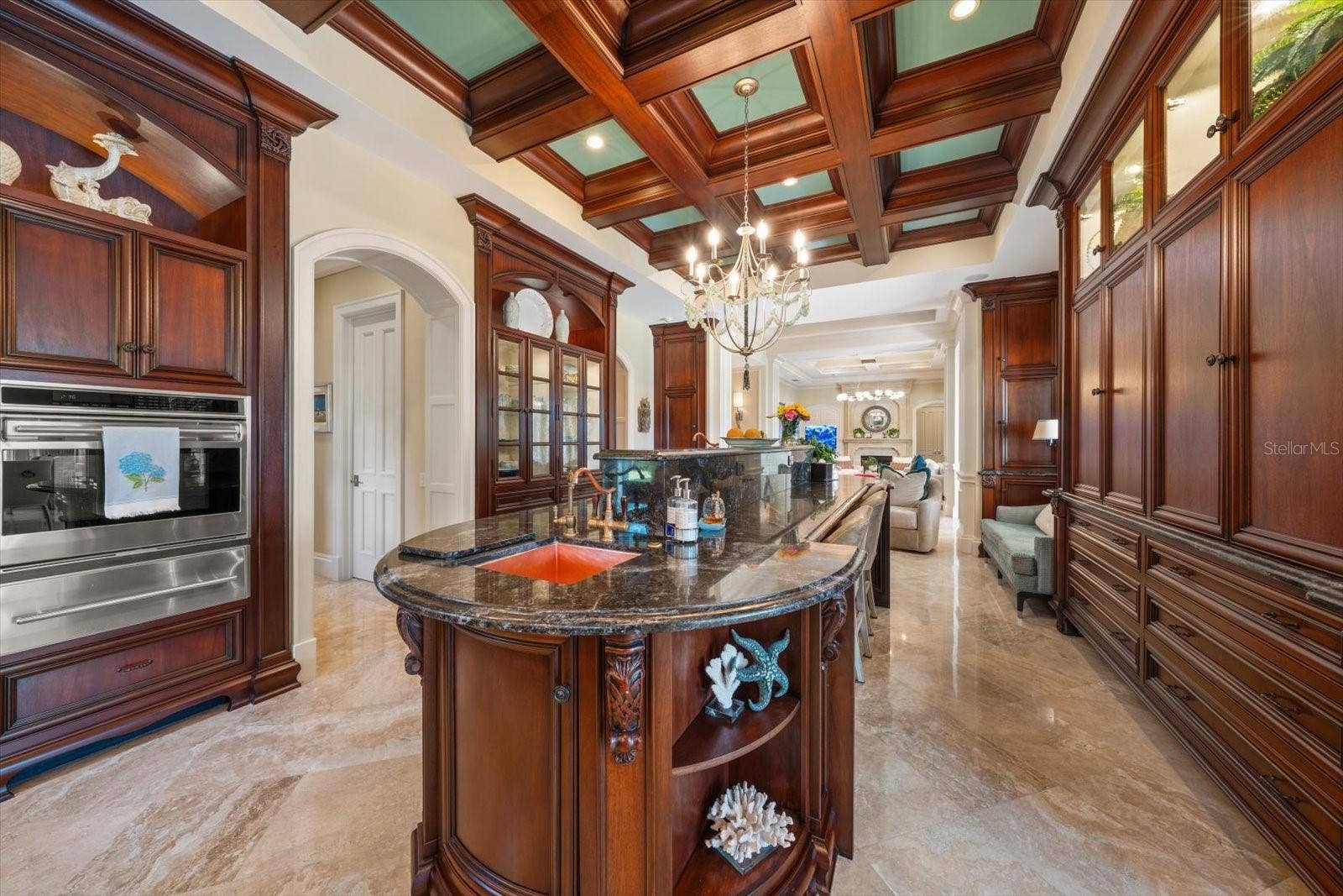 2056 COVE TRACE, Palm Harbor, FL 34685 Impressive 13-foot island with two copper sinks