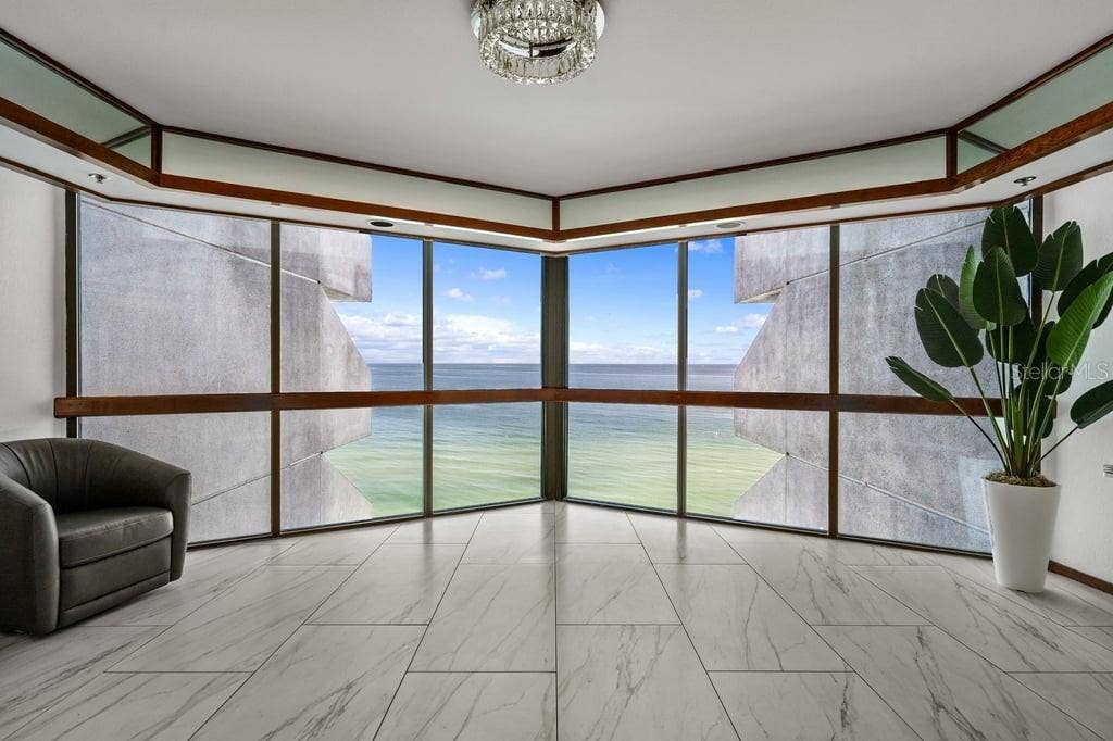 1660 GULF BOULEVARD, #706, Clearwater, FL 33767 Floor 7 elevator foyer overlooking the sand and water,