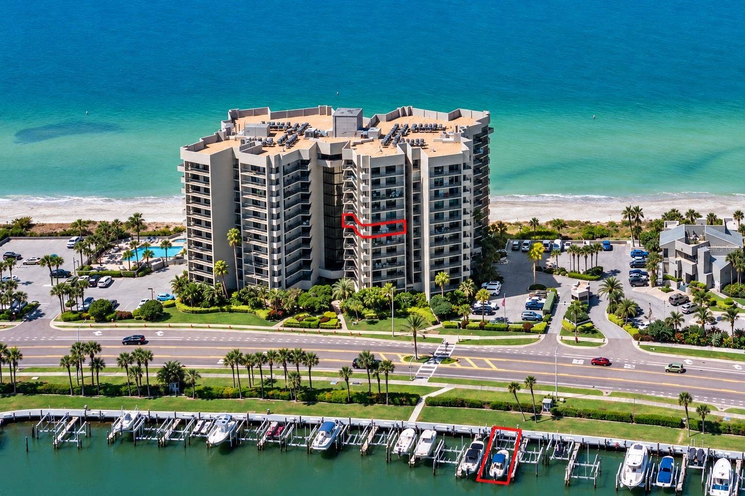 1660 GULF BOULEVARD, #706, Clearwater, FL 33767 Beachfront living meets boater's paradise. Toes in the sand and your 45' deeded yacht slip with 2 lifts.
