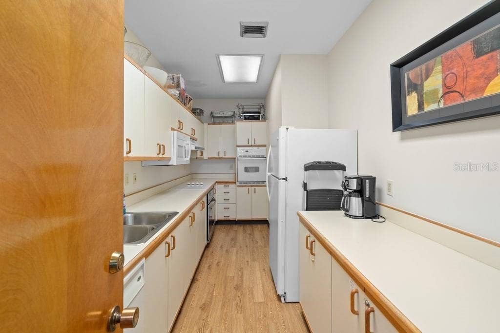 1660 GULF BOULEVARD, #706, Clearwater, FL 33767 Clubhouse Kitchen.