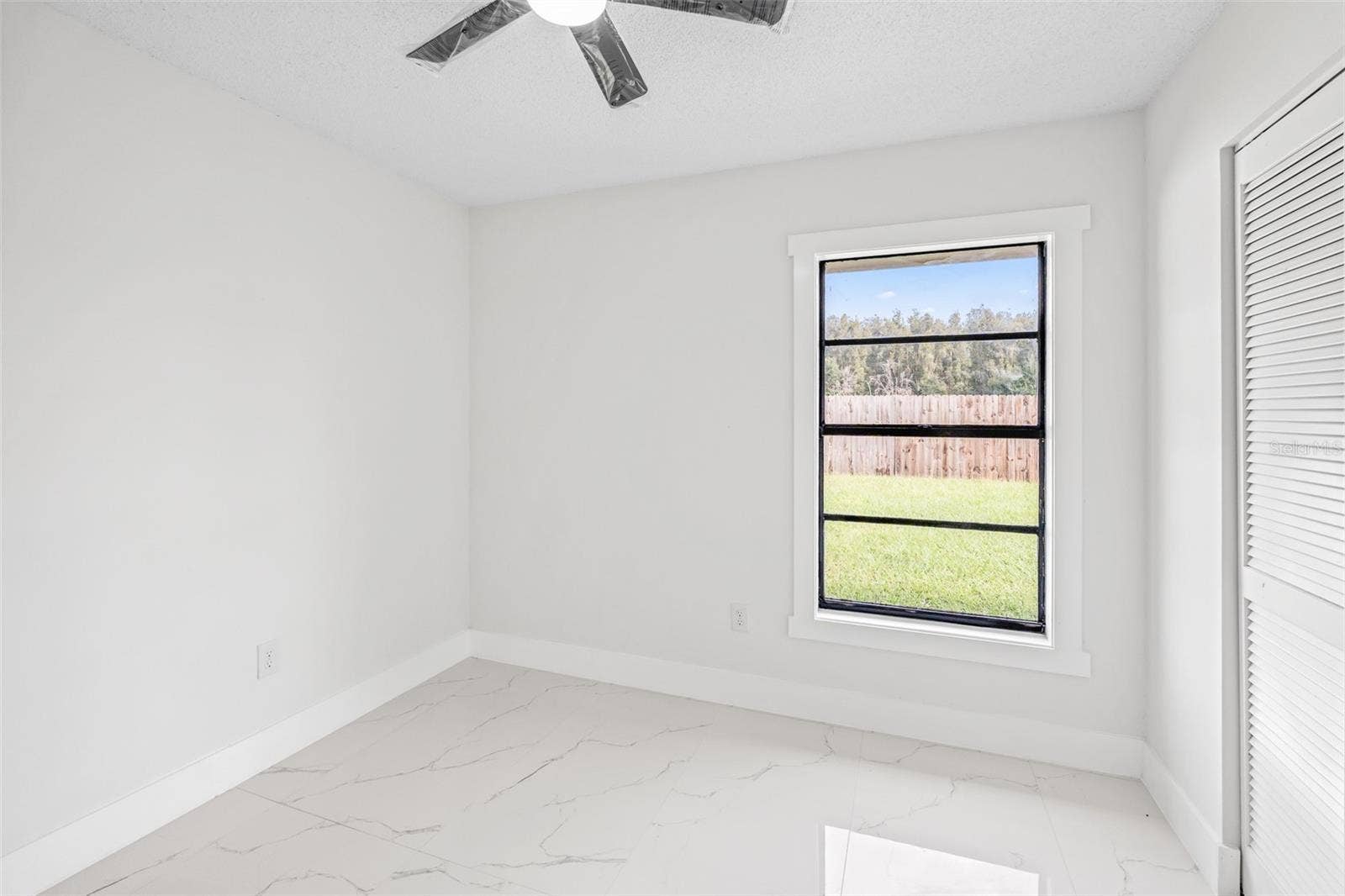 7131 HOLLOWELL DRIVE, Tampa, FL 33634