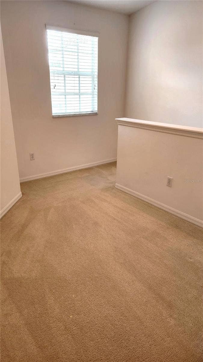 642 SPRING LAKE CIRCLE, Tarpon Springs, FL 34688 Loft Area leading to 2nd and 3rd Bedroom.